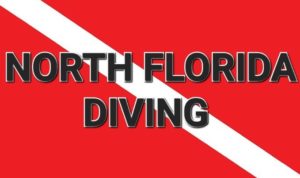 North Florida Diving Logo. Red rectangle with diagonal white line and black letters reading North Florida Diving