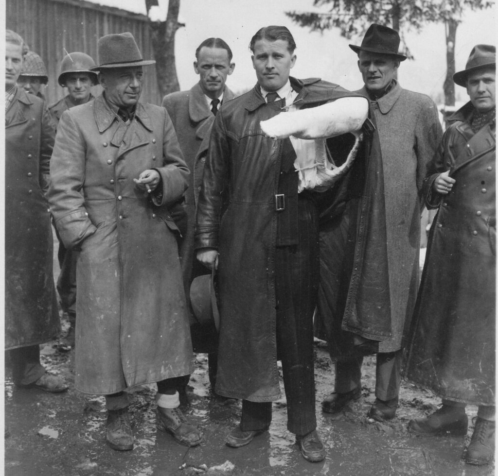 Von Braun, with his arm in a cast, Walter Dornberger (on the left) and Bernhard Tessmann (on the right) surrendered to the Americans just before this 3 May 1945 photo.